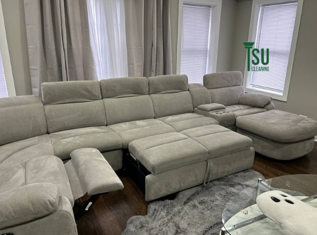 Large fabric sectional in a Chicago living room being serviced by TSU Cleaning